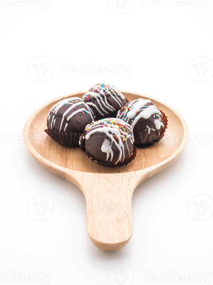 Fancy chocolate ball on white background photo