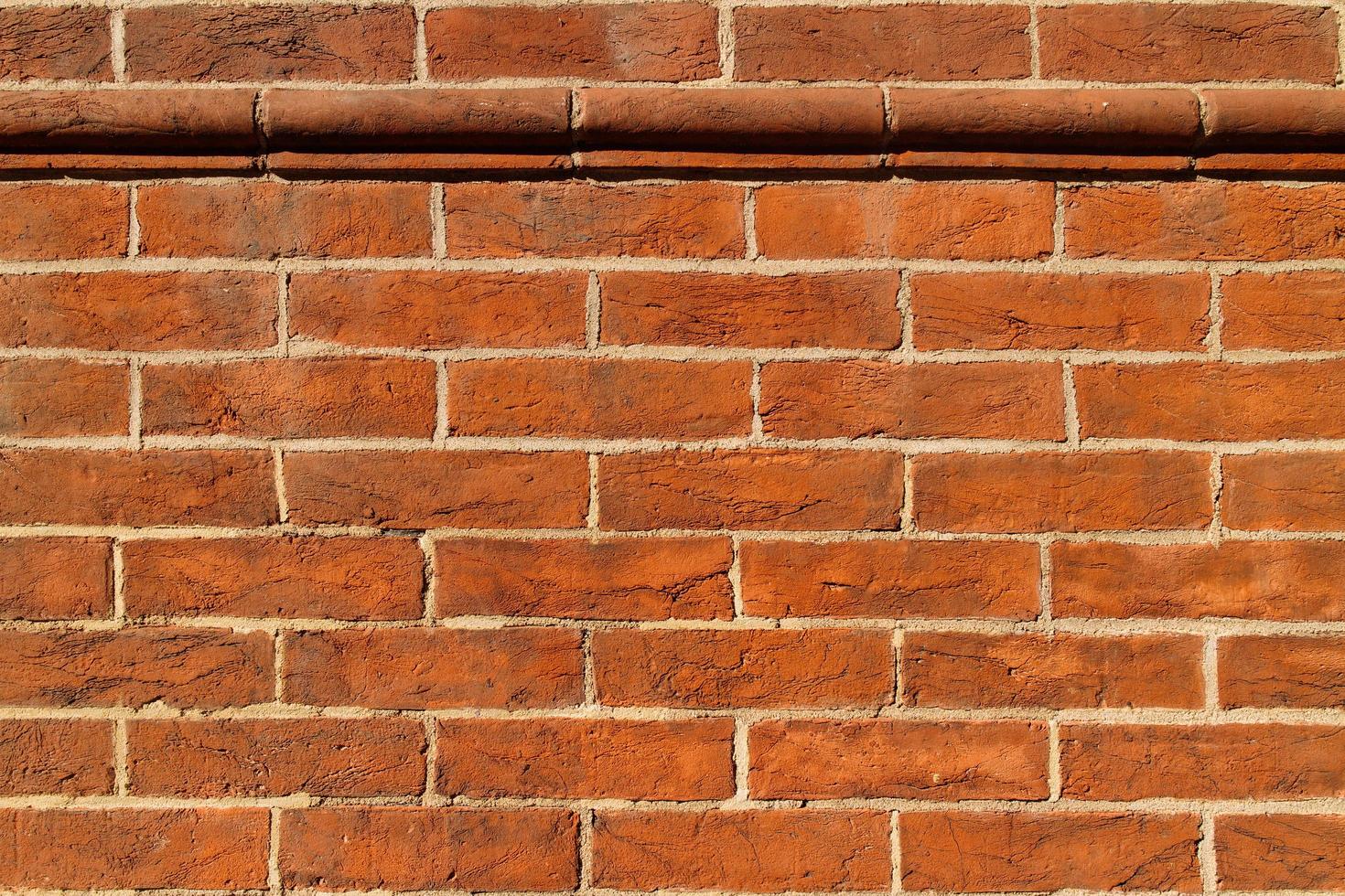 Antique brick wall texture background. photo