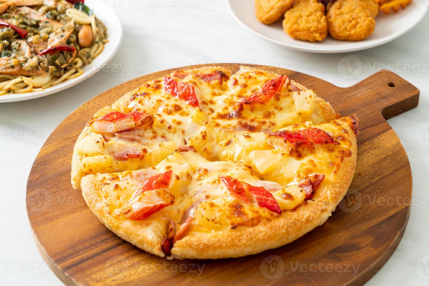 Ham and crab stick pizza or Hawaiian pizza photo