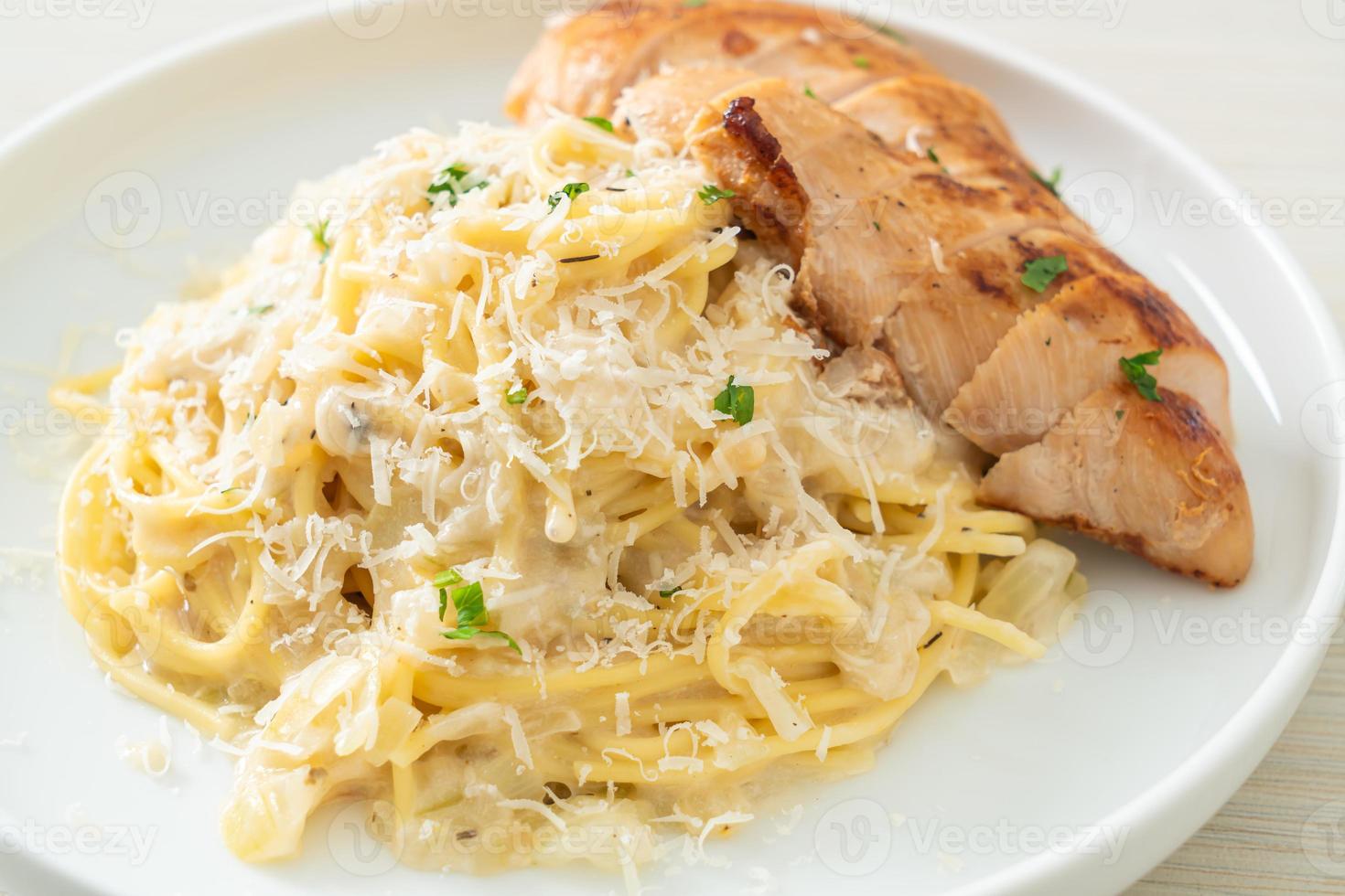 Homemade spaghetti white creamy sauce with grilled chicken photo