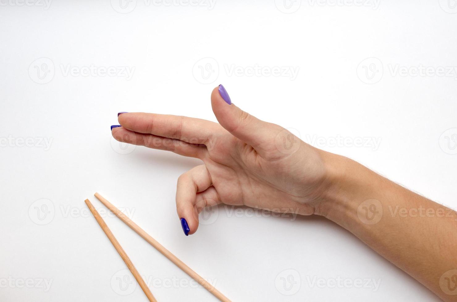 An example of how to hold sticks photo