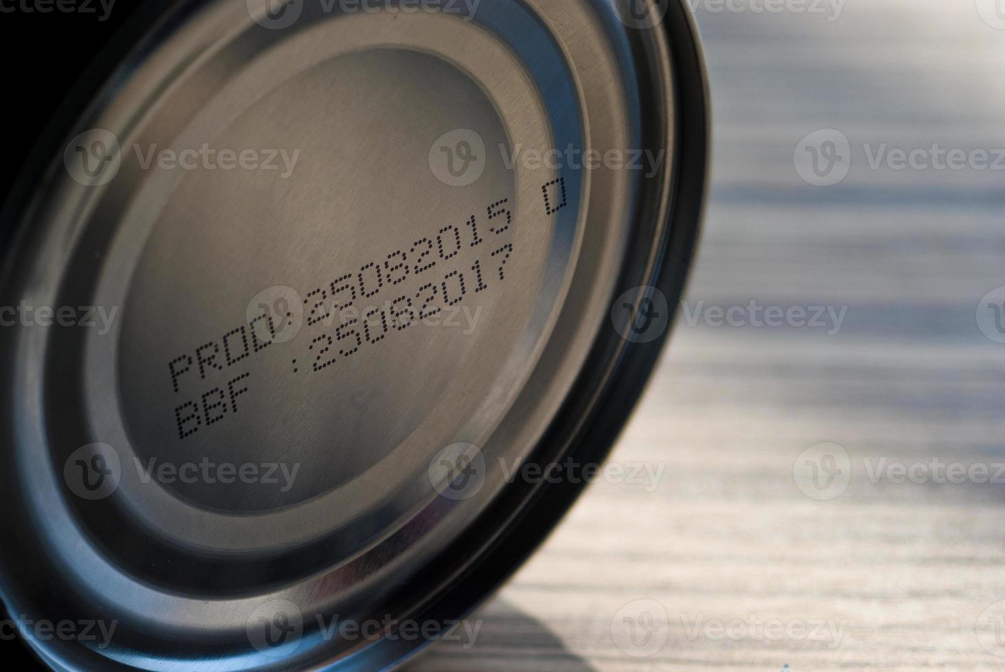 Expire date printed on bottom of canned food photo