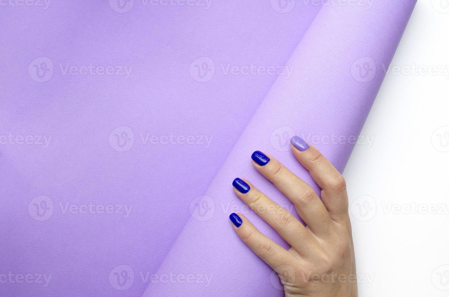 Stylish trendy women's manicure. Blue and lilac photo