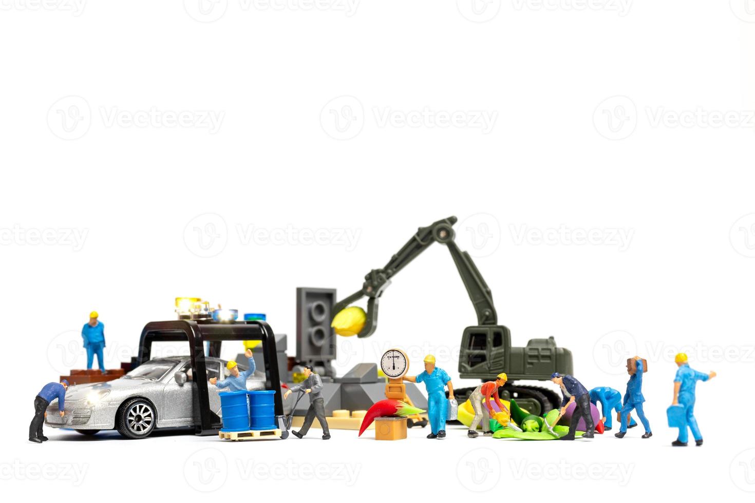 Miniature people work at Bio fuel pump station photo