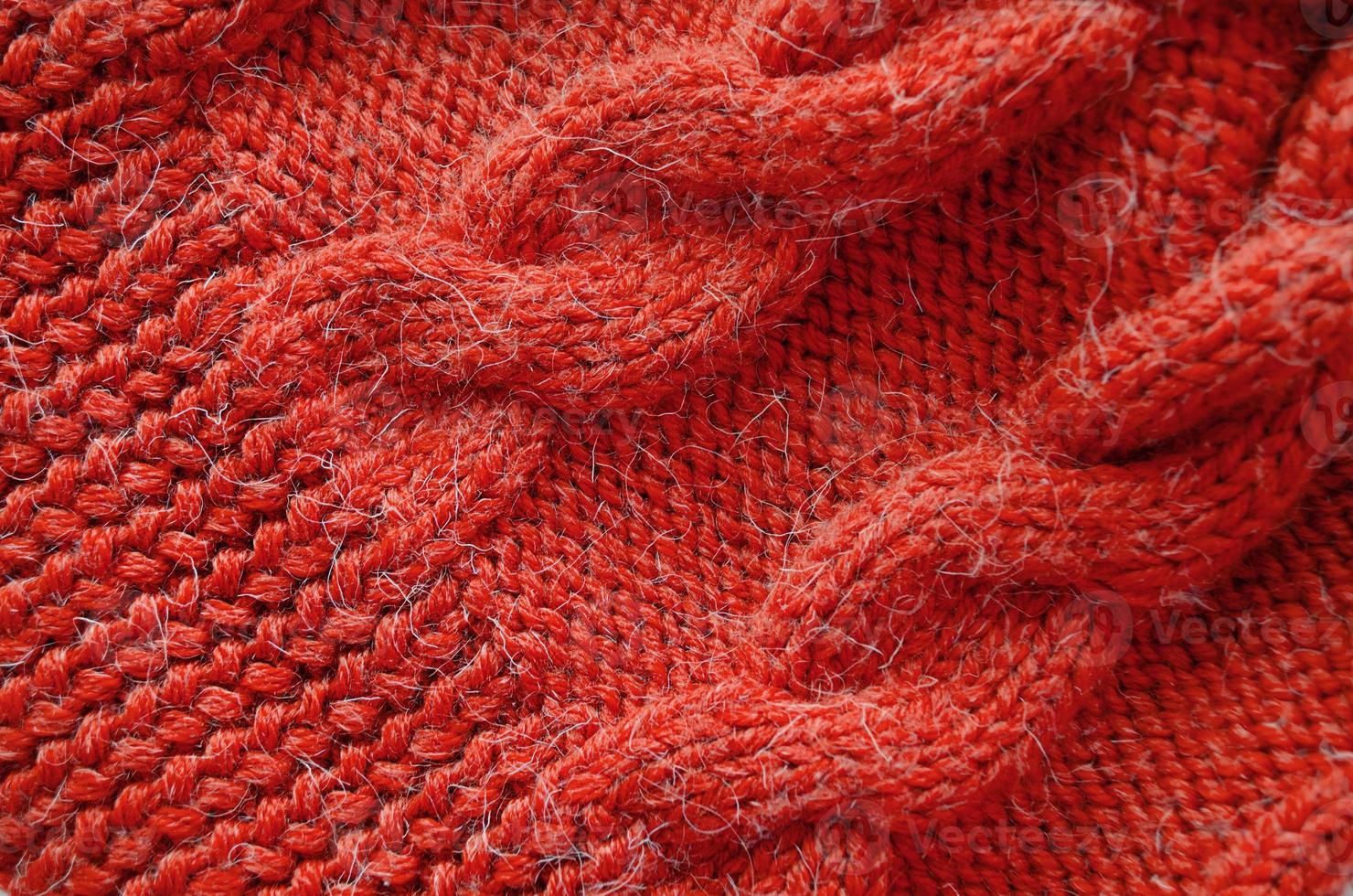 Knitted background. Knitted texture. Knitting pattern of wool. photo