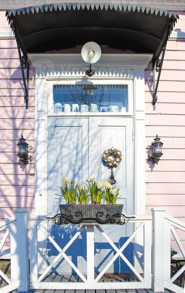 Entrance door. Easter wreath. photo