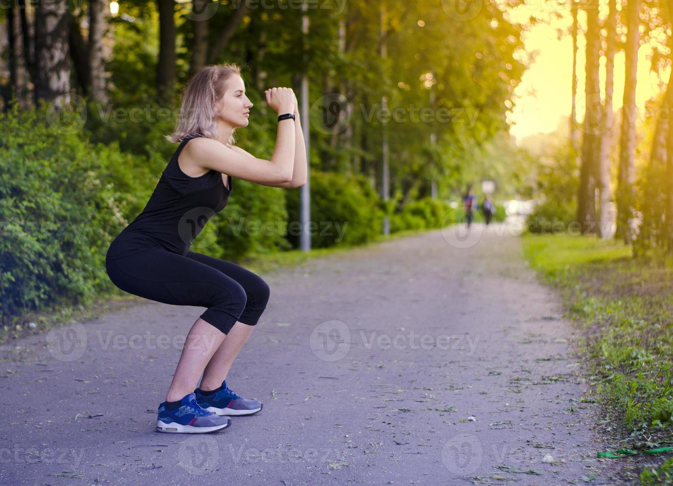 Girl squatting. Healthy lifestyle. Exercises. Squat. Photo. photo