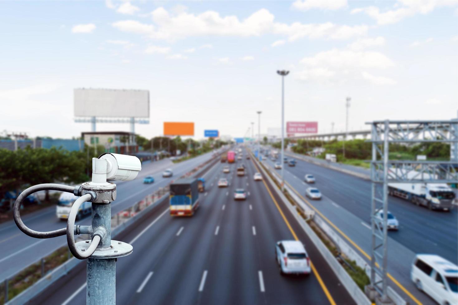 CCTV cameras on the overpass for recording road traffic. photo