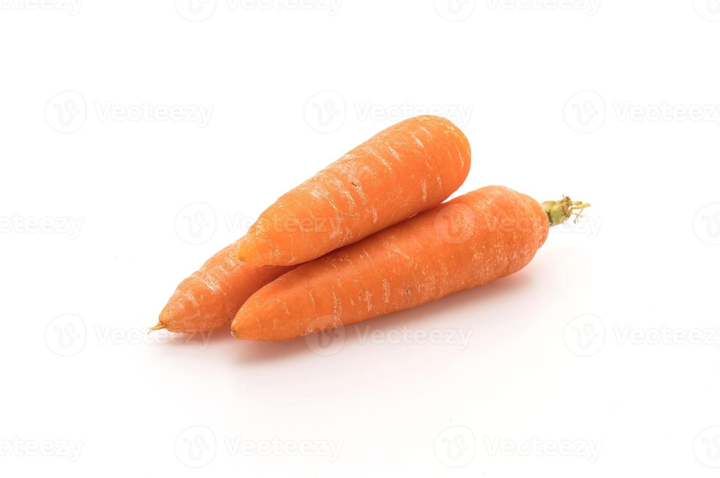 zanahorias baby sobre fondo blanco foto