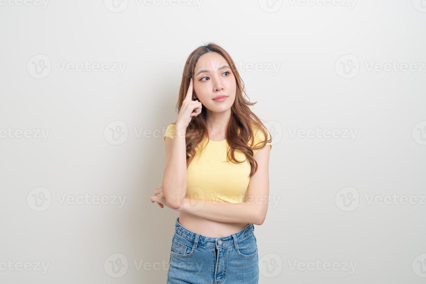 Portrait beautiful Asian woman thinking on white background photo