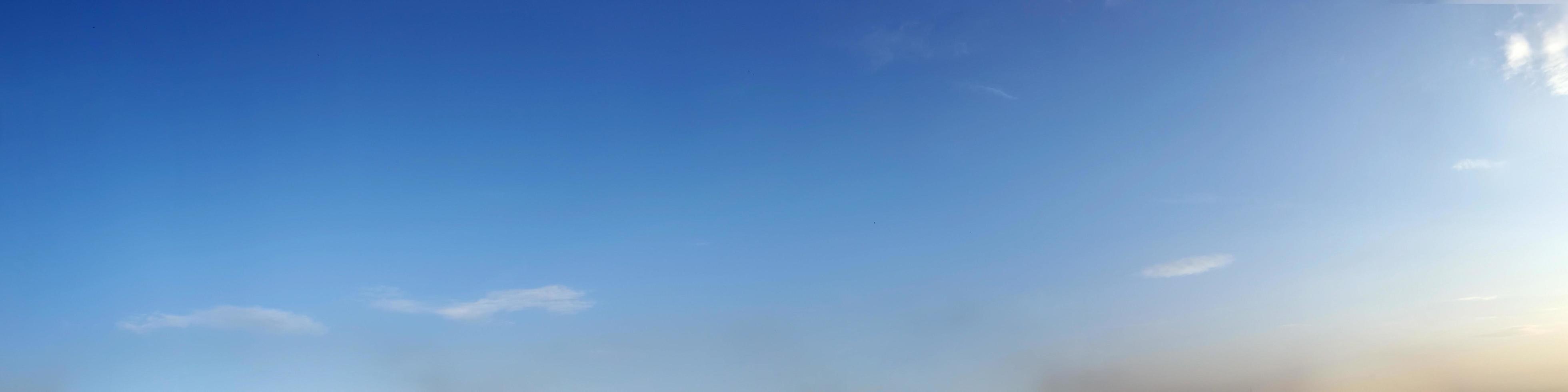 Panoramic sky with cloud on a sunny day. photo