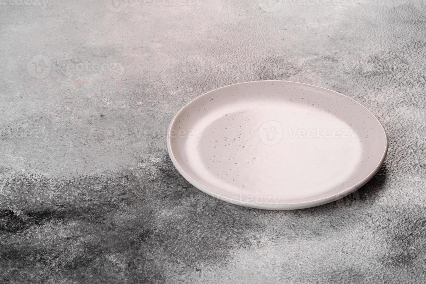 White plate isolated on a white background photo