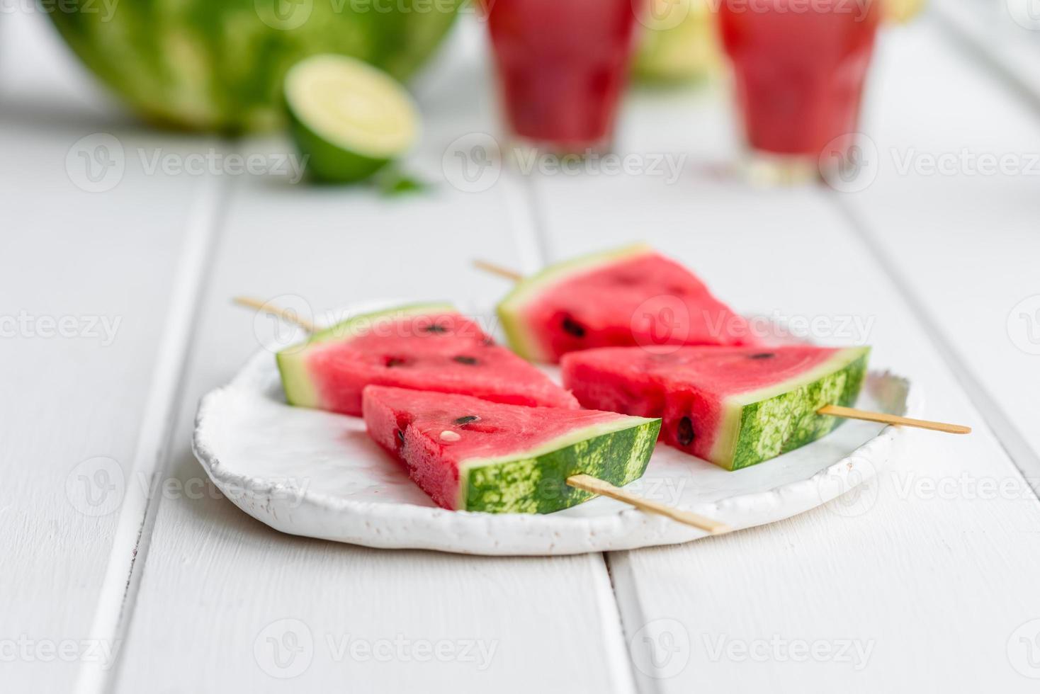 Fresh delicious watermelon sliced with mint and watermelon juice photo