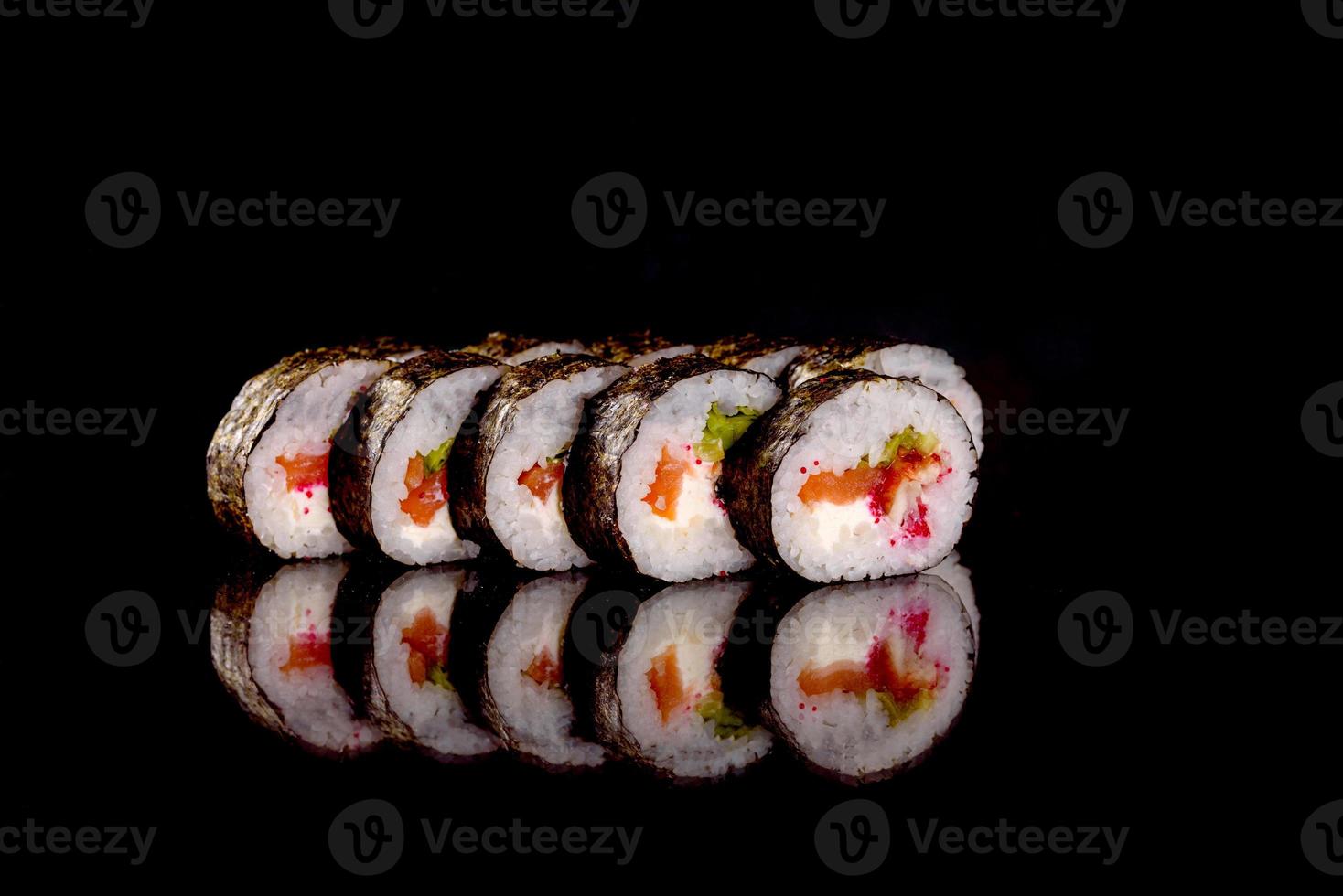 Fresh sushi rolls prepared from the best varieties of fish and seafood photo
