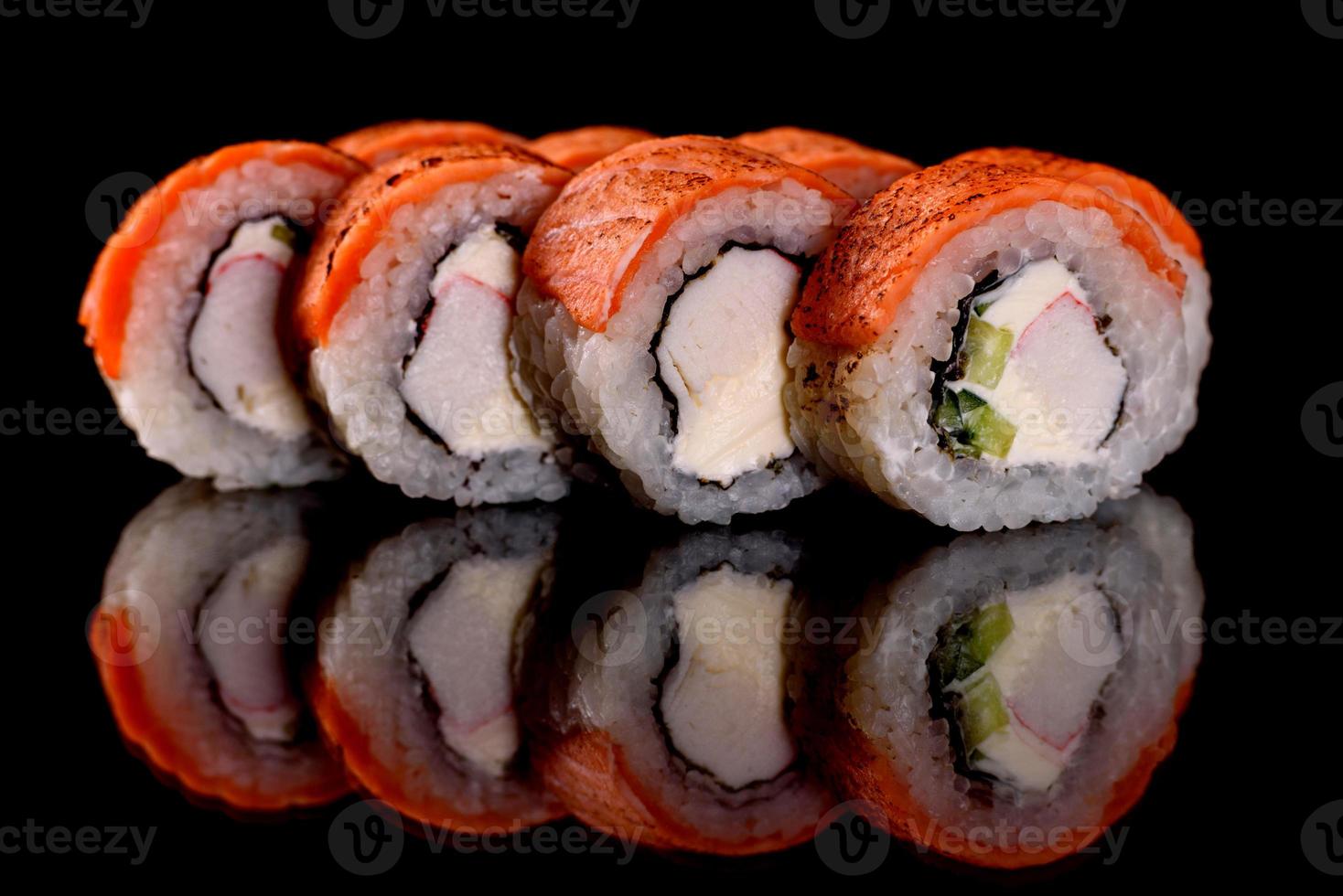 Fresh sushi rolls prepared from the best varieties of fish and seafood photo