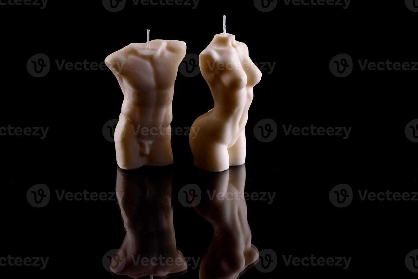 Beautiful candle in the shape of a human body photo