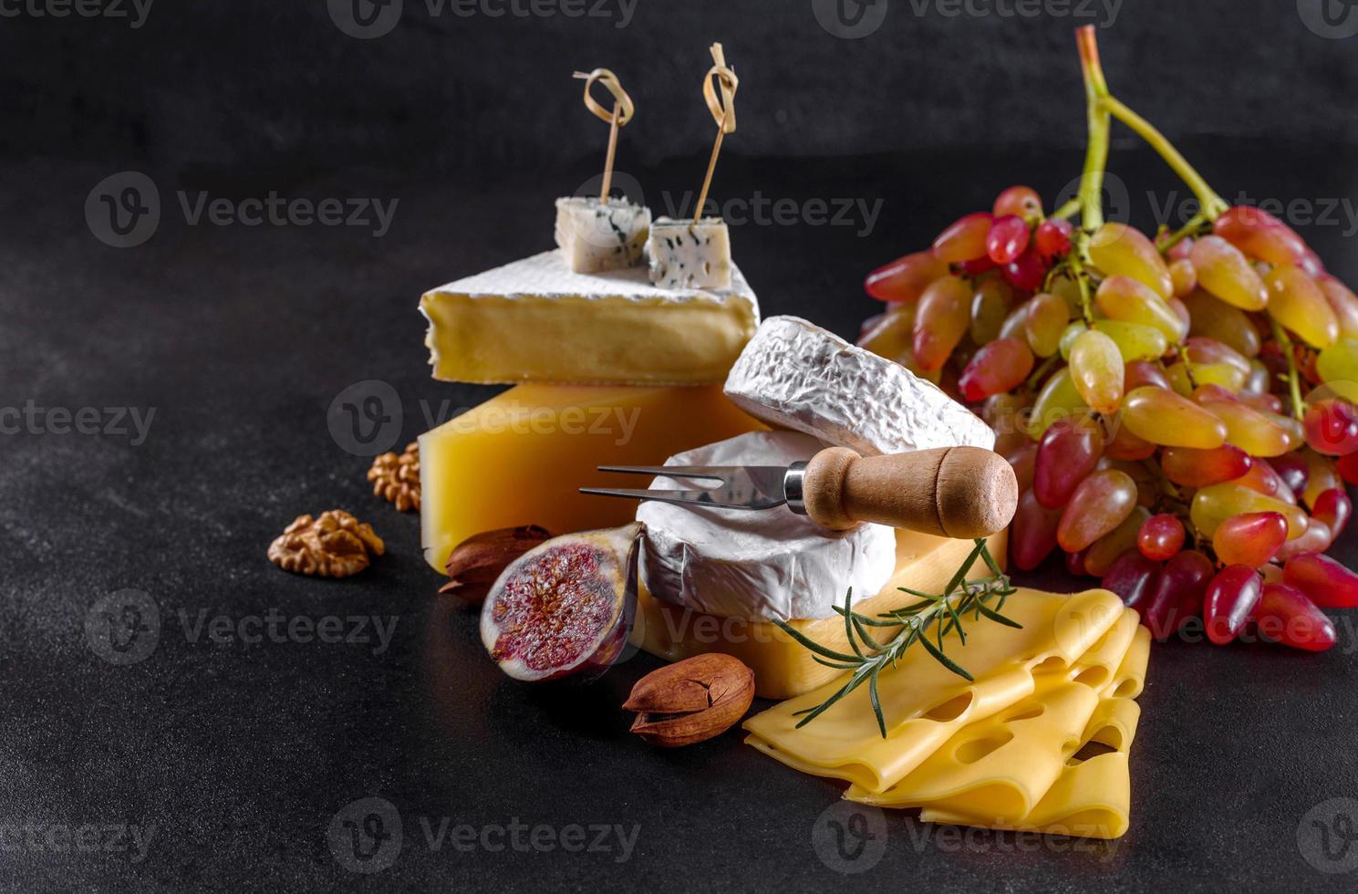 Beautiful delicious camembert cheese, parmesan, brie photo