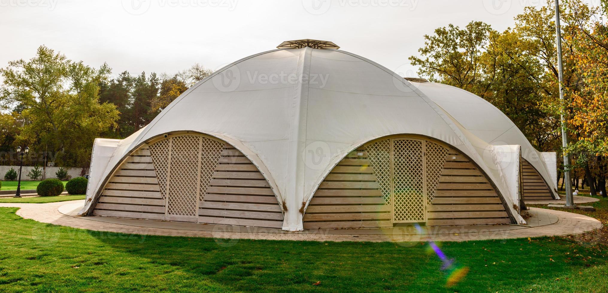 Summer-type cafe with cloth tent on the roof photo