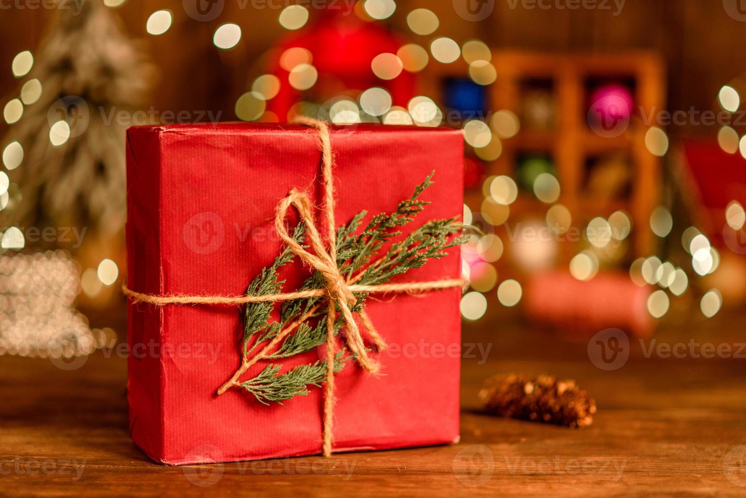 Beautiful multi-colored Christmas decorations on a wooden table photo