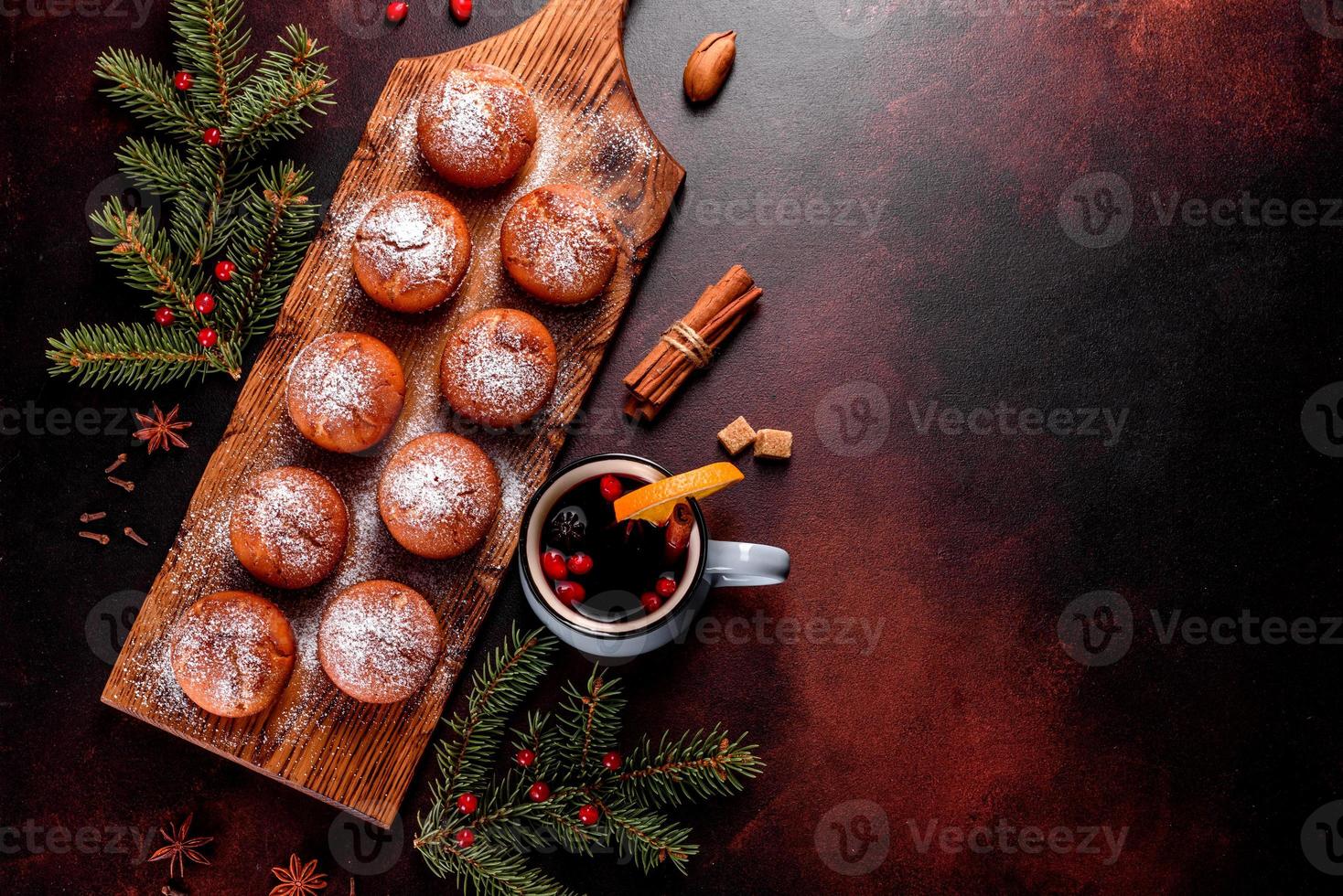 Beautiful delicious fresh cocoa muffins on the Christmas table photo