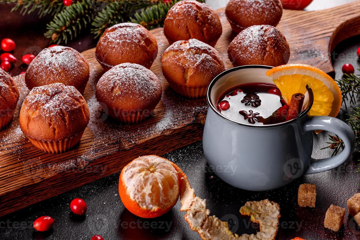 Beautiful delicious fresh cocoa muffins on the Christmas table photo