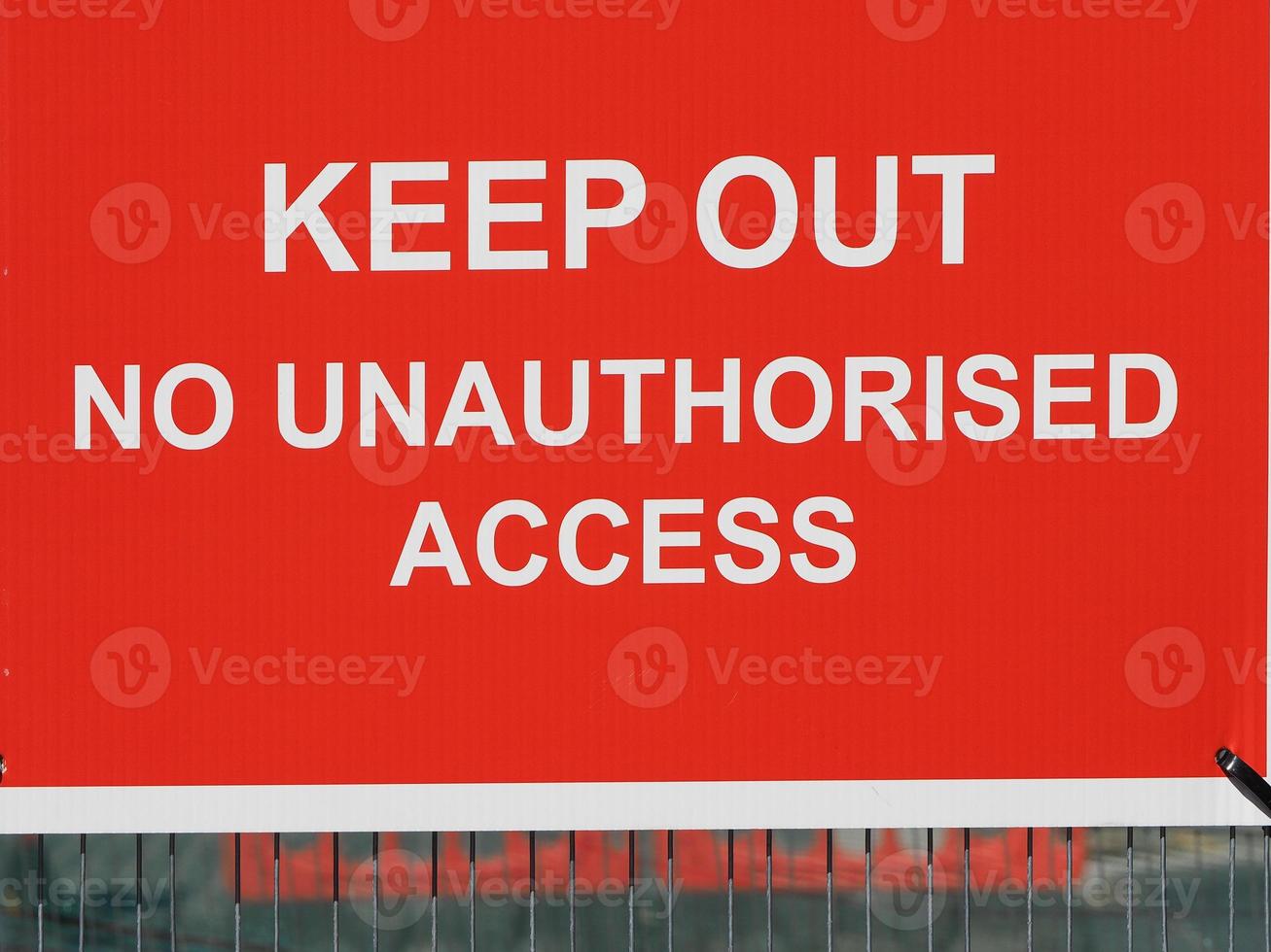 Keep Out No Unauthorised Access warning sign in a construction site photo