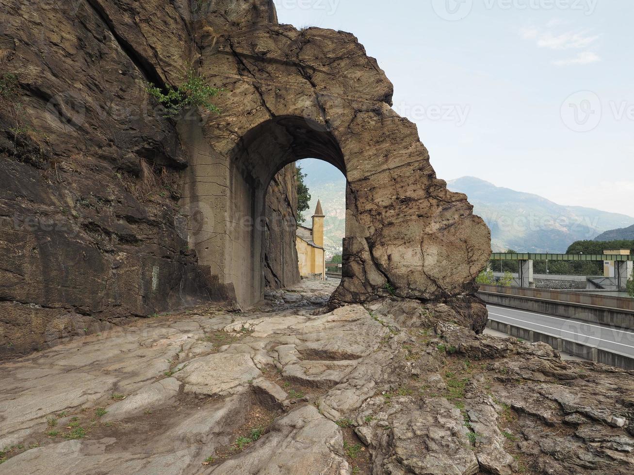 Ancient roman road arch in Donnas photo