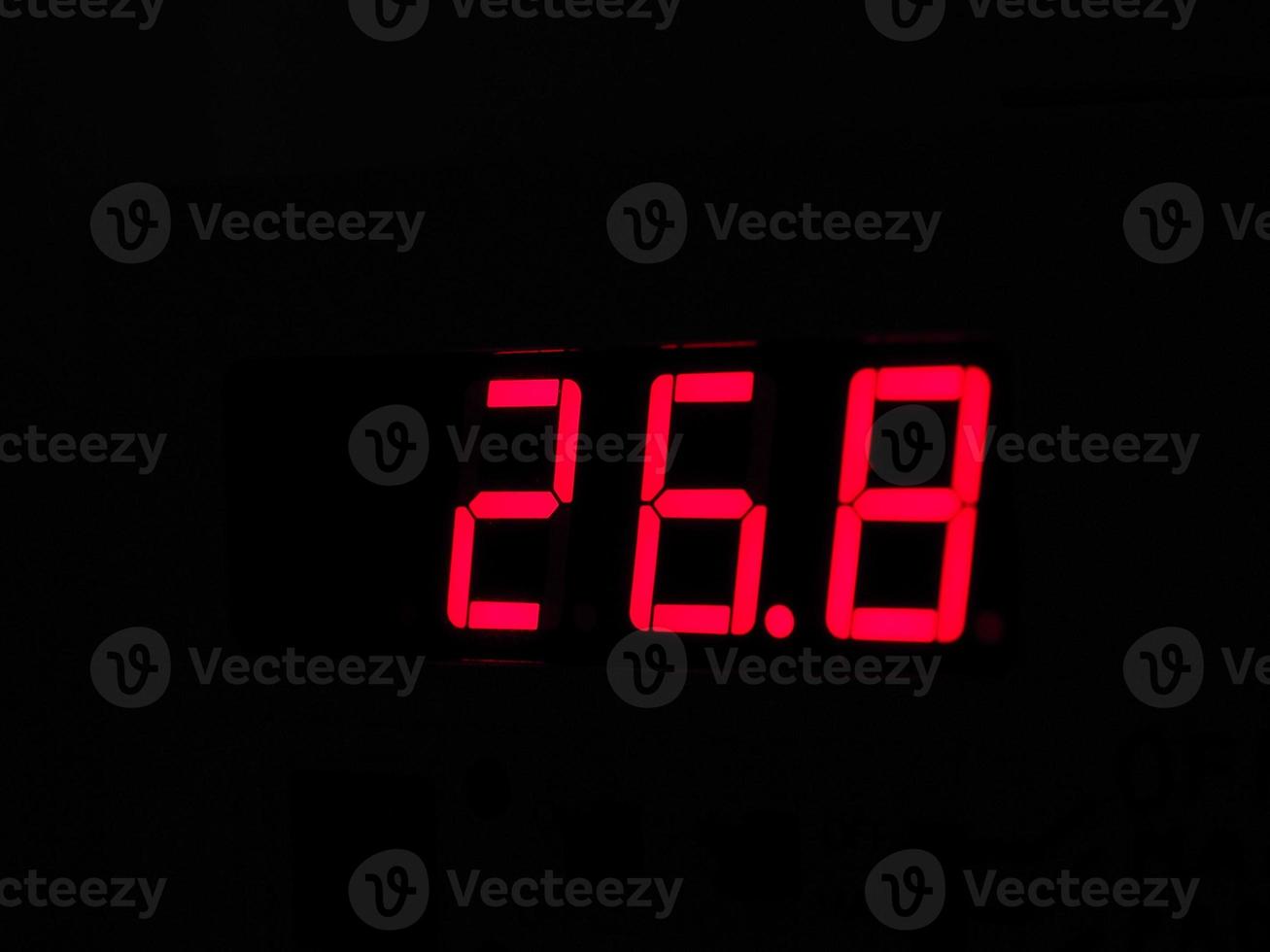 Digital LCD display of thermometer showing hot temperature in Ce photo