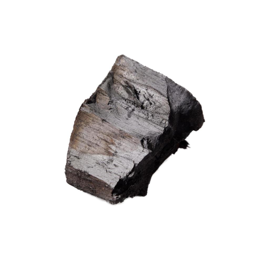 Wood charcoal isolated on a white background photo