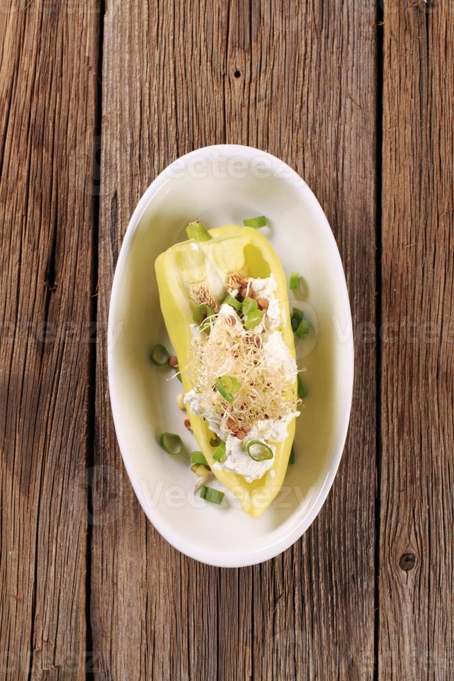 Pepper with curd cheese and lentil sprouts photo