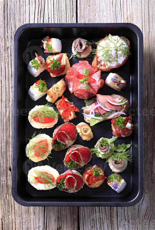 Various types of canapes photo