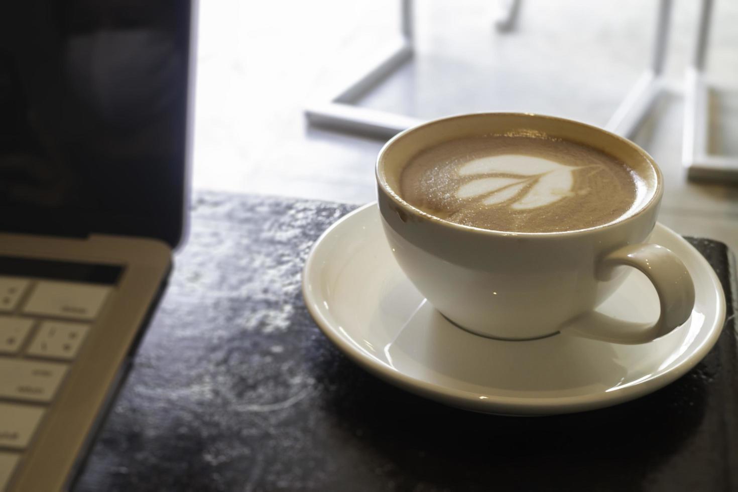 arte latte en café con leche caliente foto