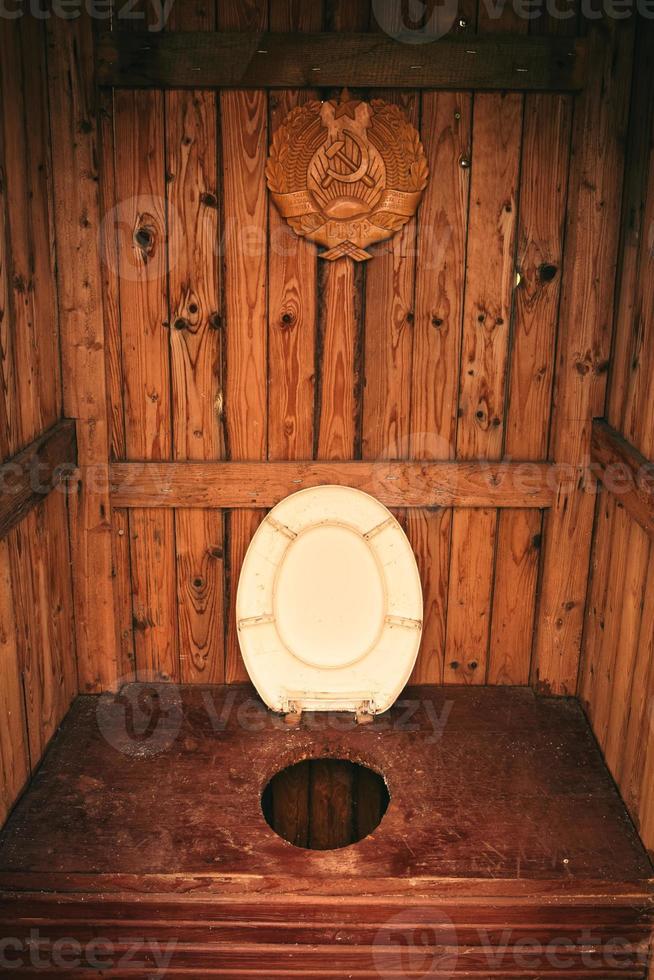 Wooden cabin toilet interior photo