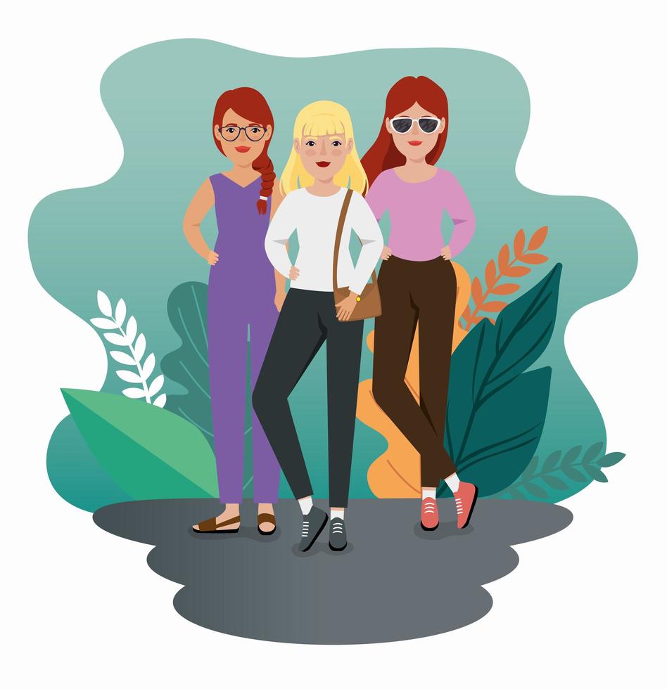 grupo de hermosas mujeres de pie con hojas tropicales vector