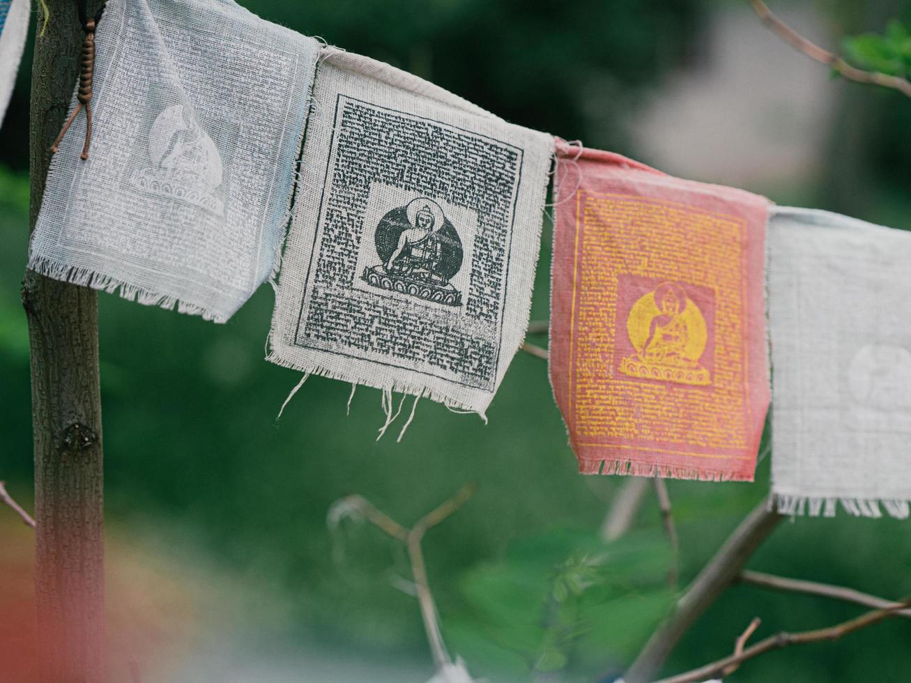 prayer flags with mantra outdoor. tibetan Lungta flags photo