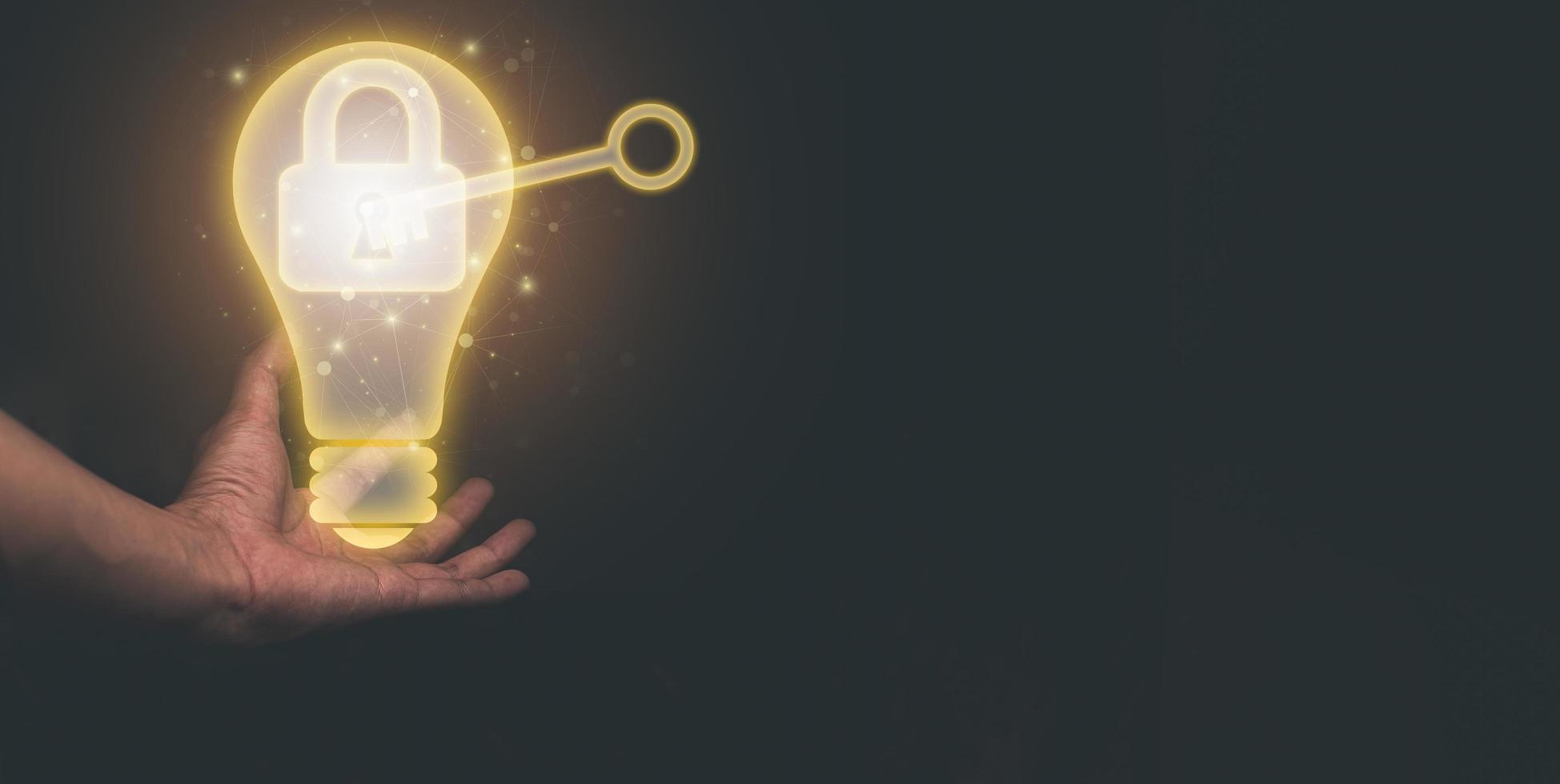 Hand holding light bulbs, symbols, keys, unlocking ideas illustration photo