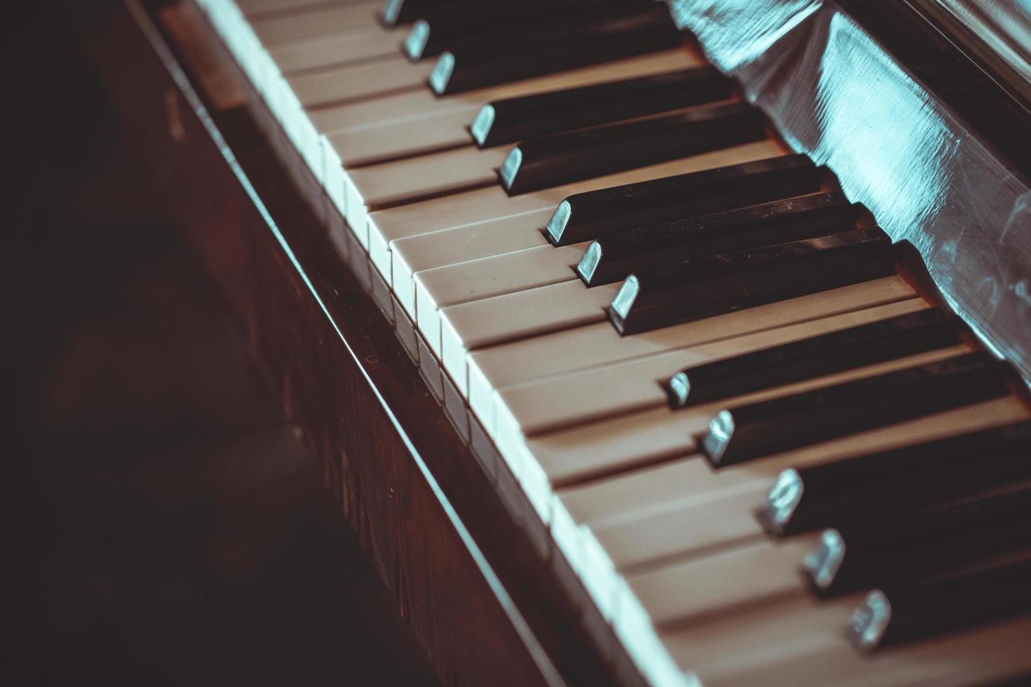 Close up old piano keyboard photo