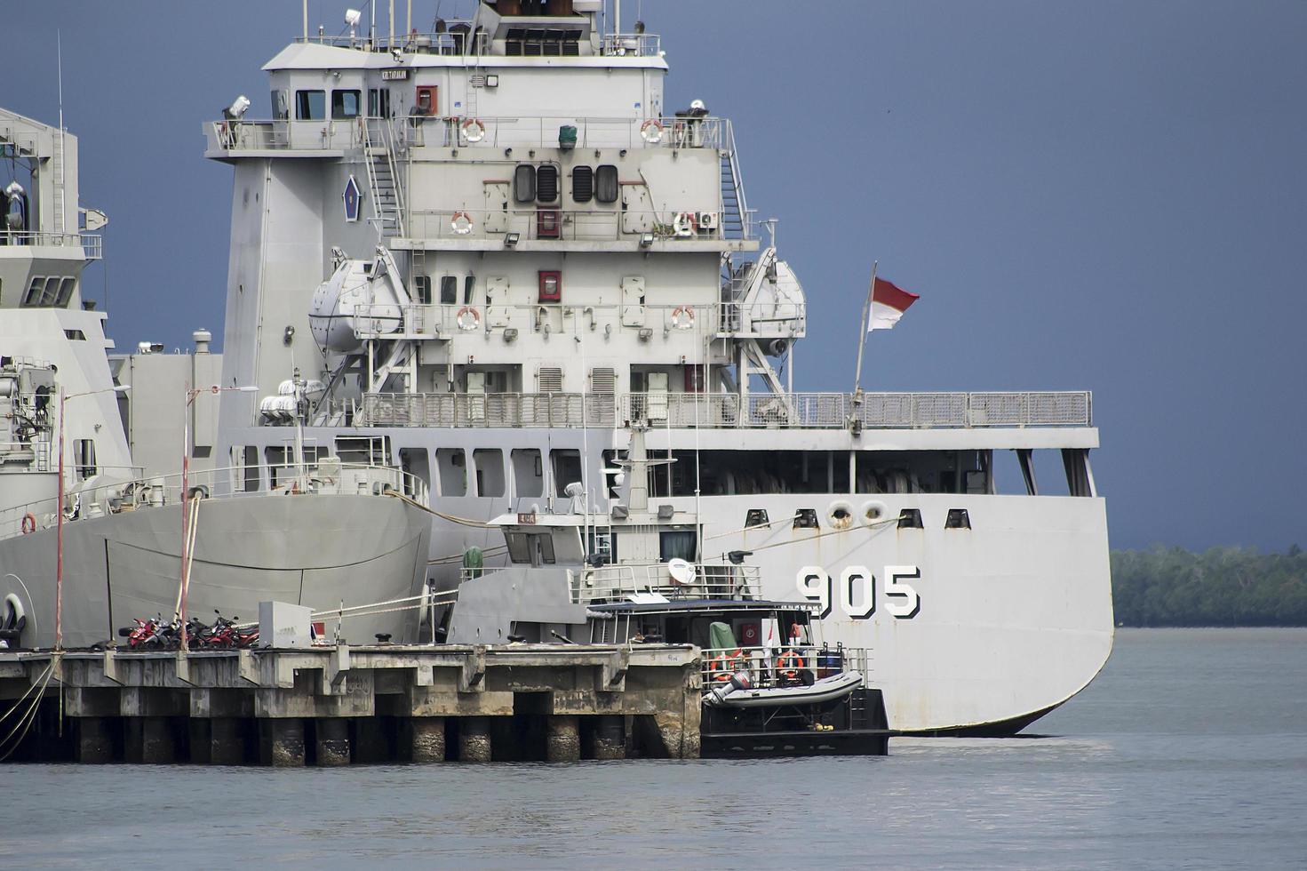 Battleship at naval dock photo