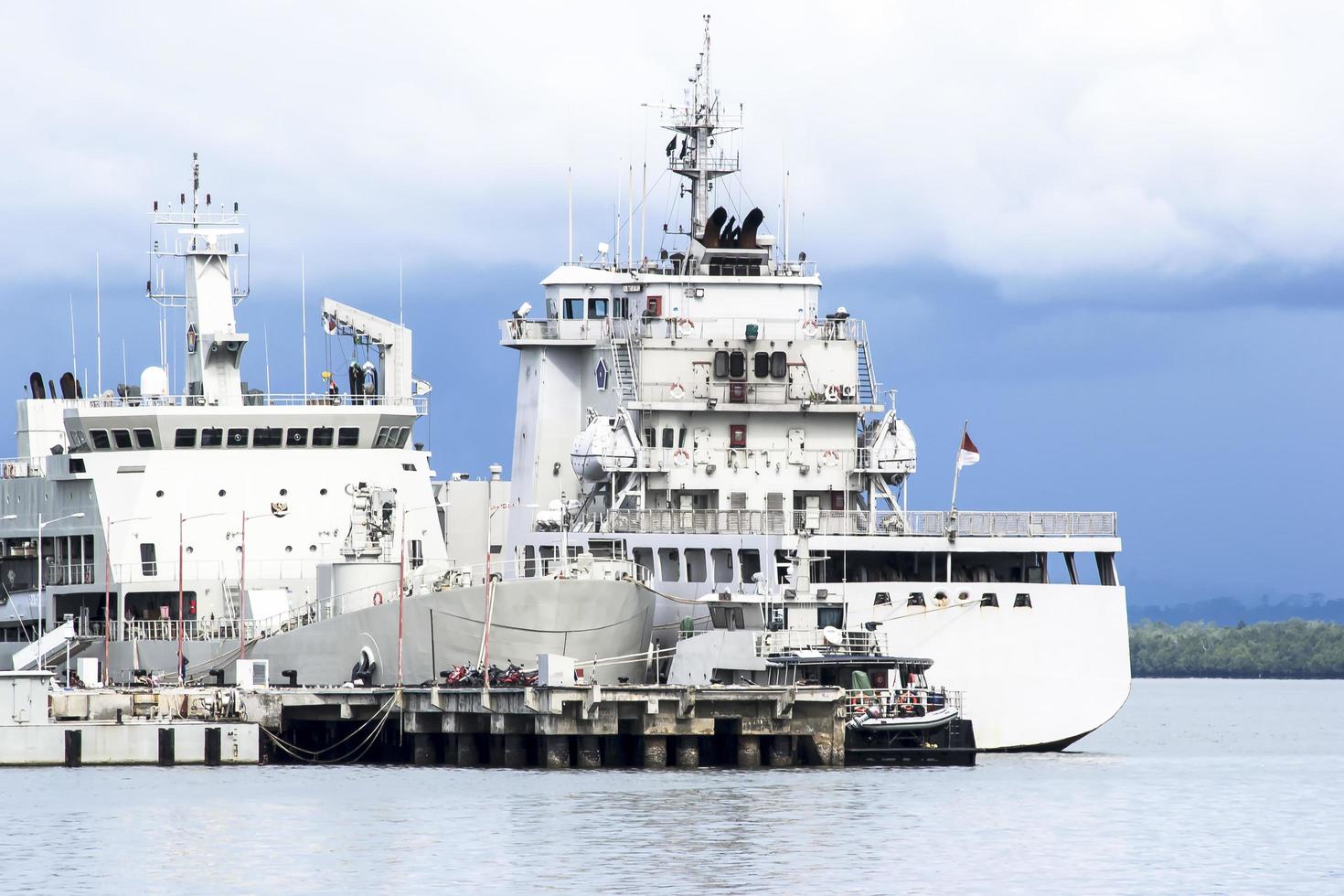 Battleship at naval dock photo