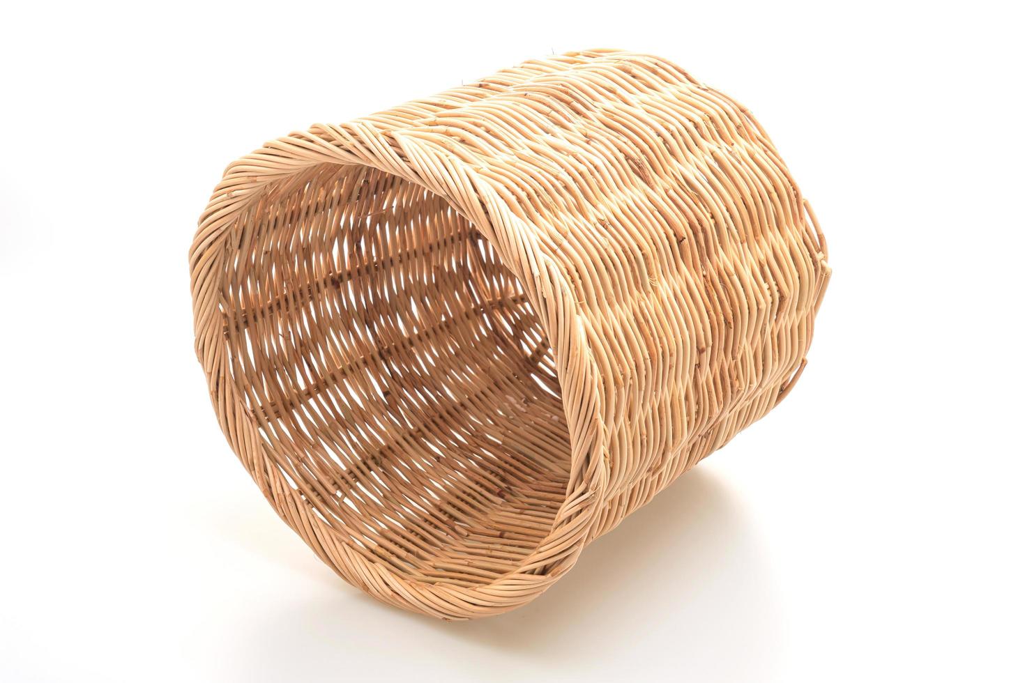 Wicker basket on white background photo