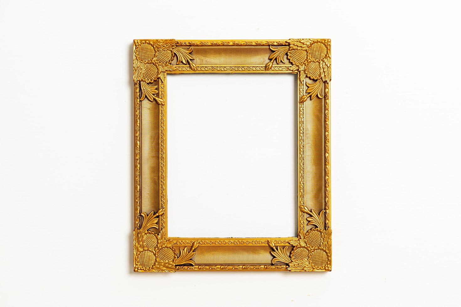 Empty picture frame on white wall background with copy space photo