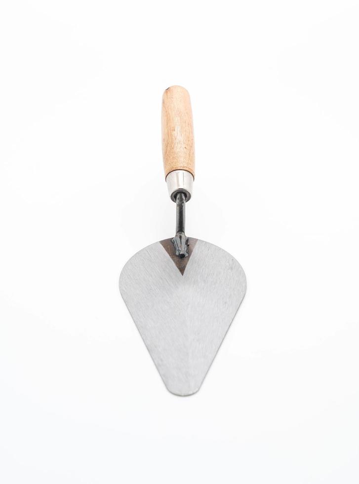 Trowel the mortar on white photo