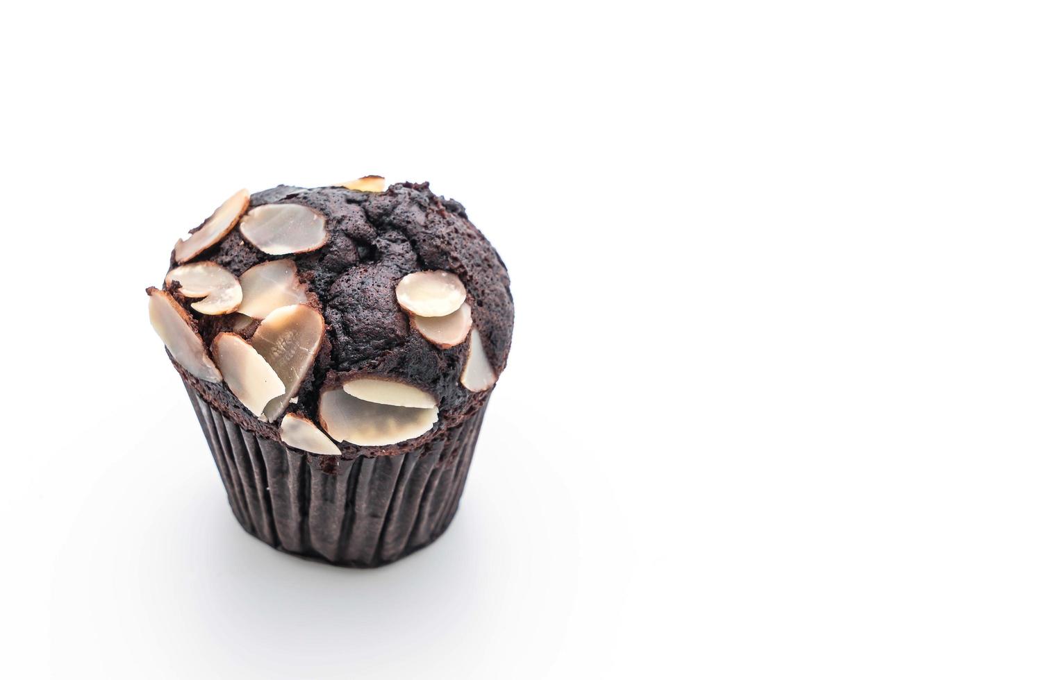 Dark chocolate cup cake on white background photo