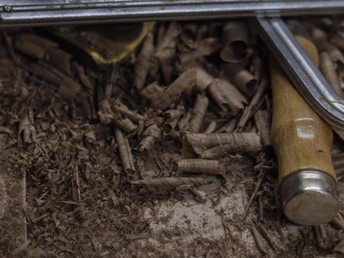 macro. wood shavings with carpentry tools photo