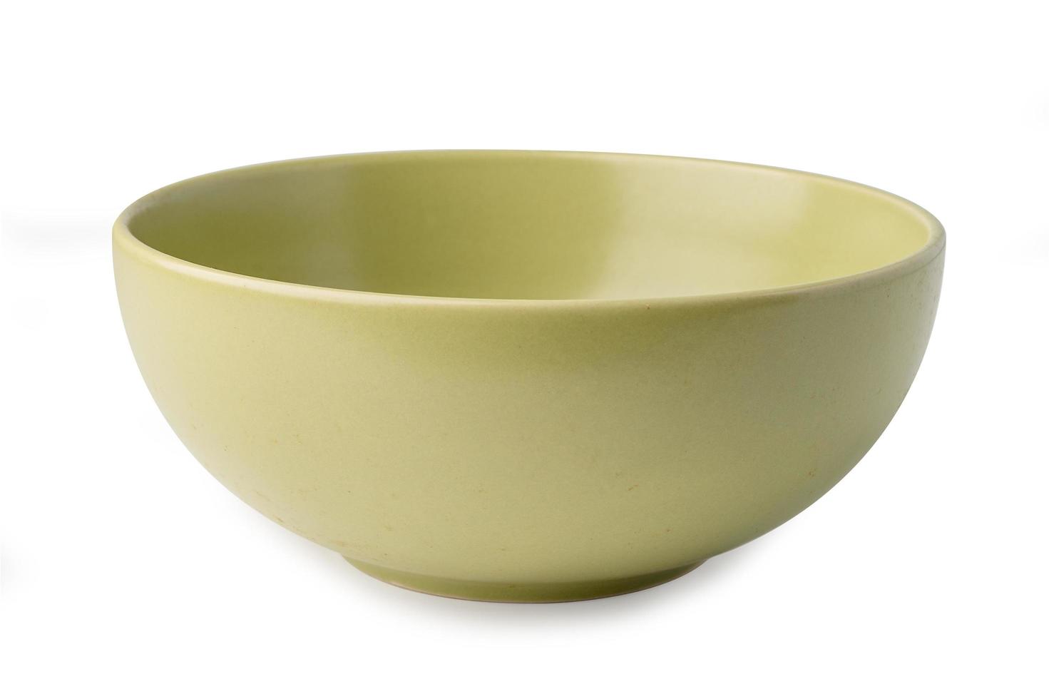 Ceramic green plate or bowl isolate on white background photo