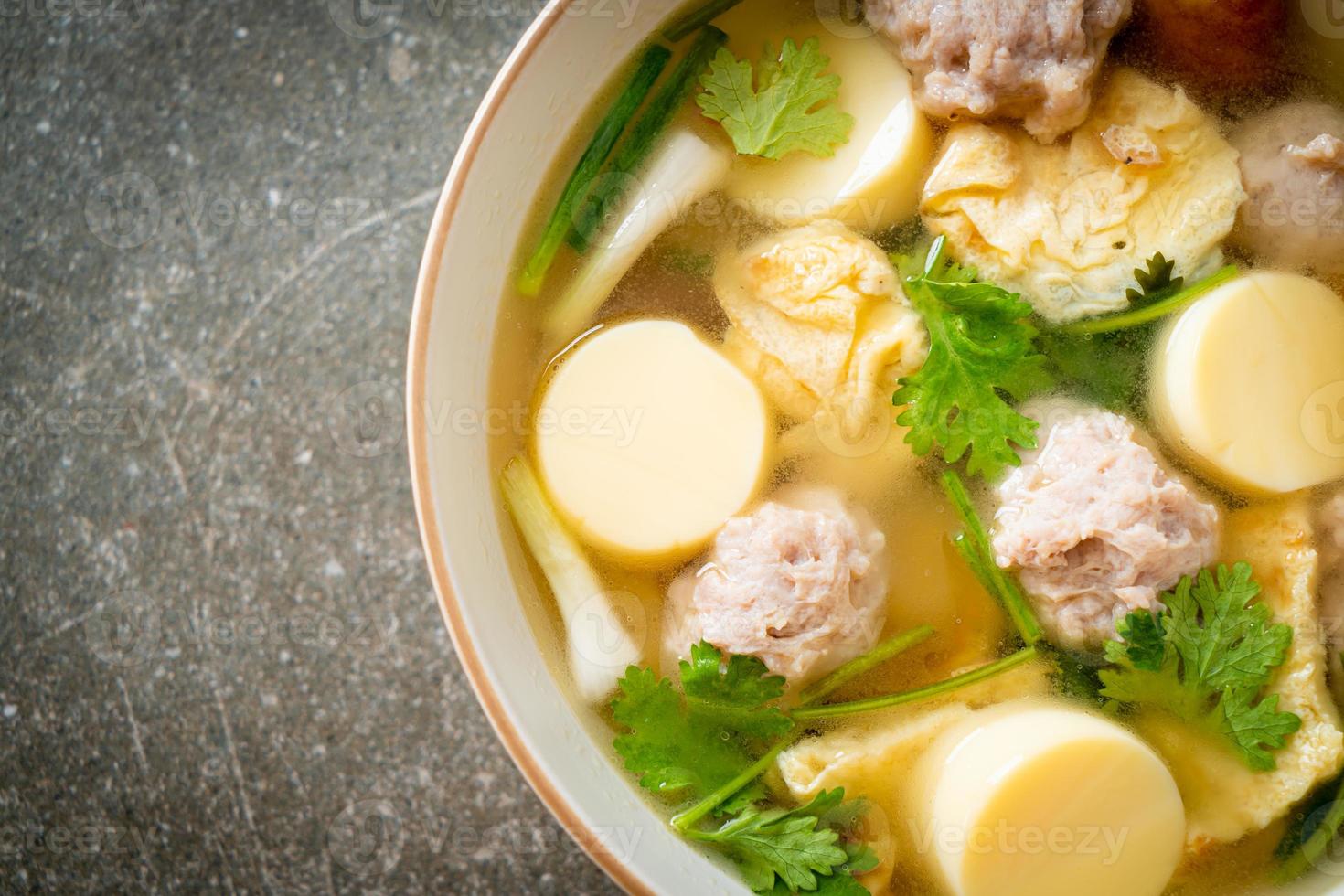 Fried egg soup or omelet soup with minced pork photo