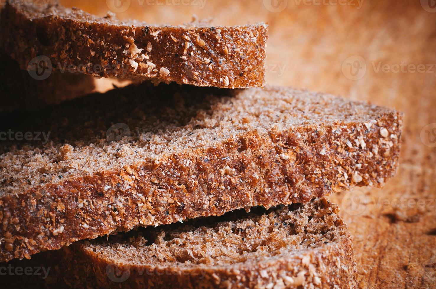 Macro view of sliced brown bread photo