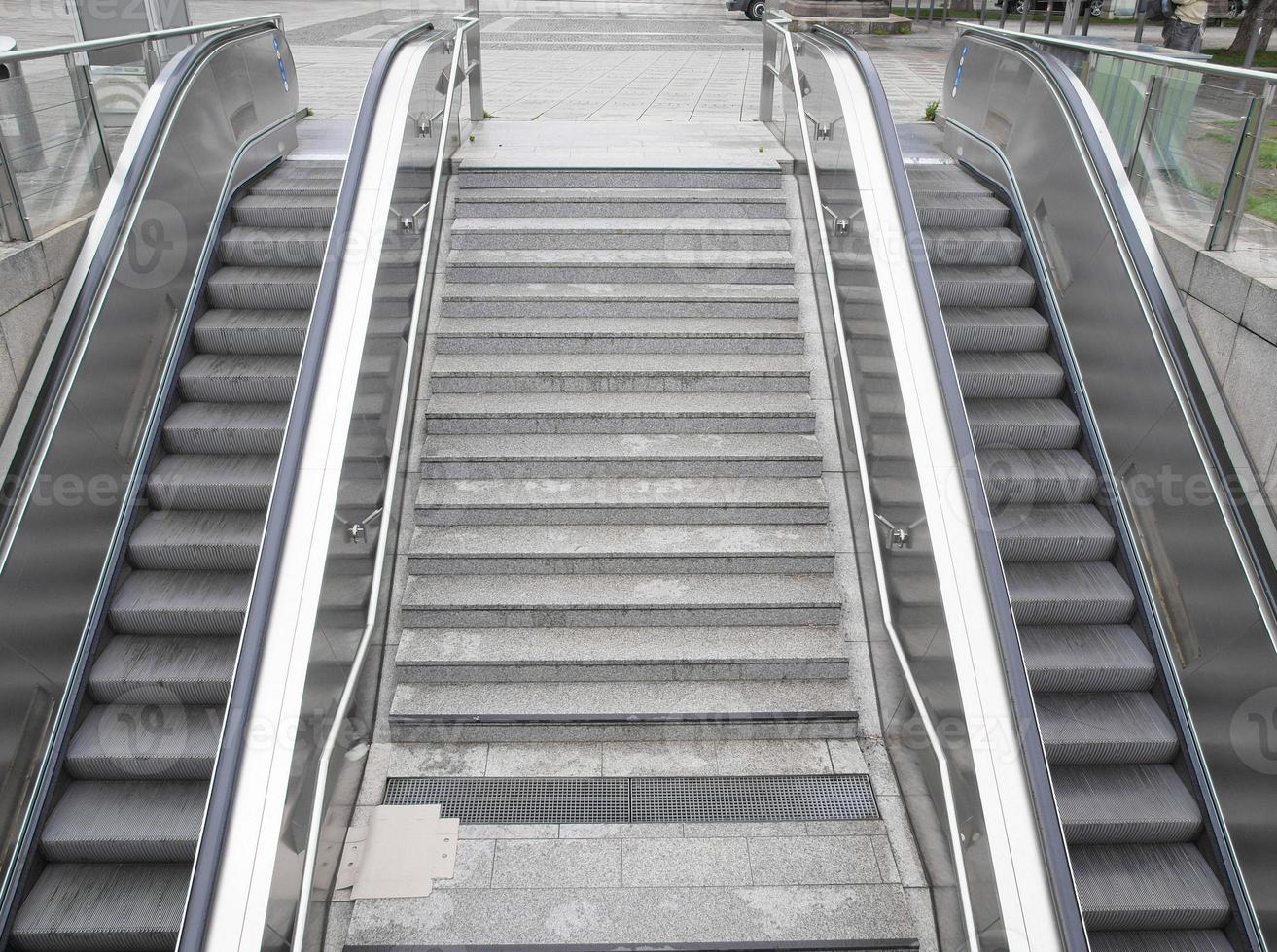 Subway station escalator stairs photo