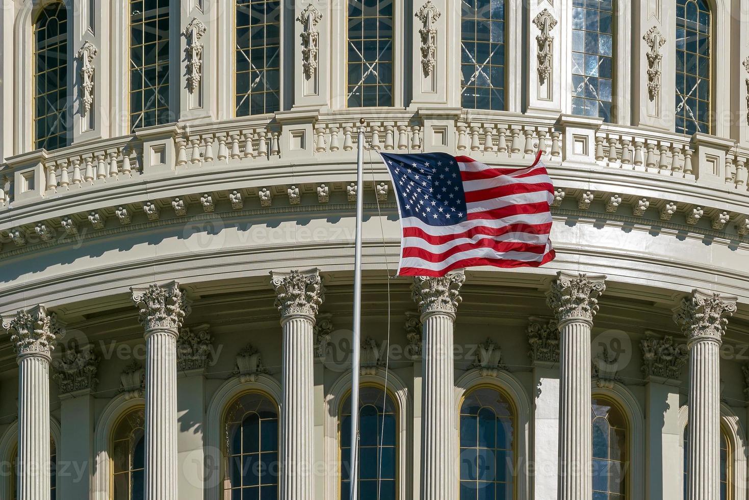 Washington DC Capitol detail with american flag photo