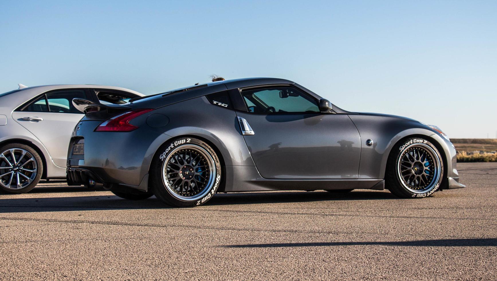 Cars on the race track and on the roads of the desert photo